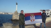 Родионов и Копцев с сербским флагом
