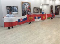 Соратники с флагами в музее Васильева